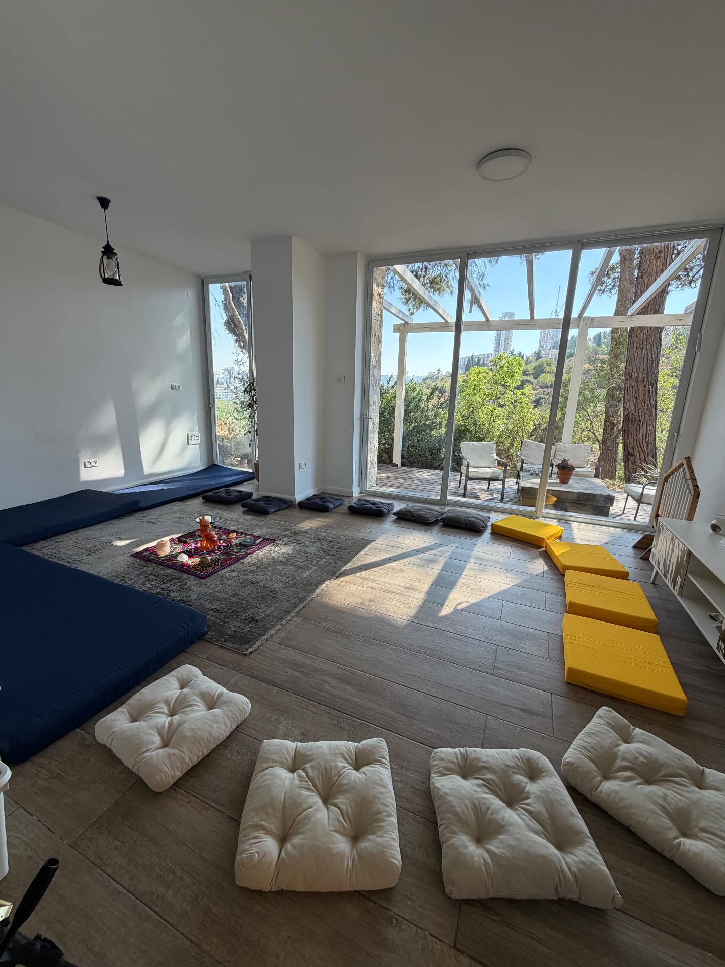 The indoor sound bath space in Zahara’s Jerusalem home, overlooking the nature valley